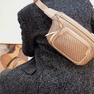 Claris Virot Romeo banane belt bag in pink metallic leather